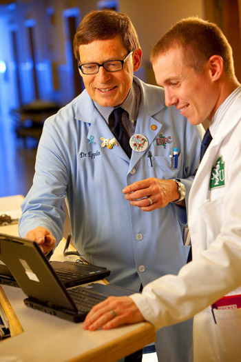 Dr. Jerome Epplin and medical student Heath Laughlin for an annual report at St. Francis Hospital in Litchfield, IL.