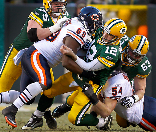 Green Bay Packers quarterback Aaron Rodgers is sacked by Chicago Bears' 