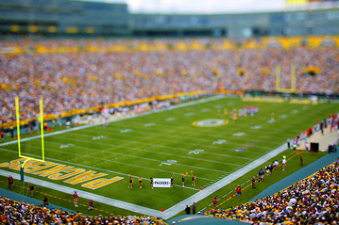 A timeout during an NFL football game between the Green Bay Packers and the Cincinnati Bengals taken with a tilt/shift lens.