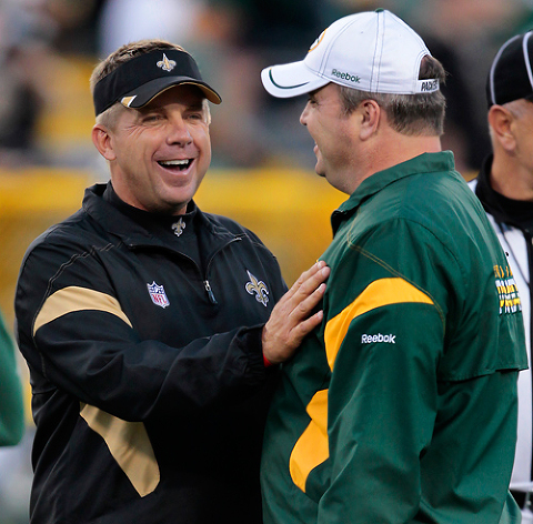 New Orleans Saints head coach Sean Payton and Green Bay Packers head coach Mike McCarthy joke around before the game.