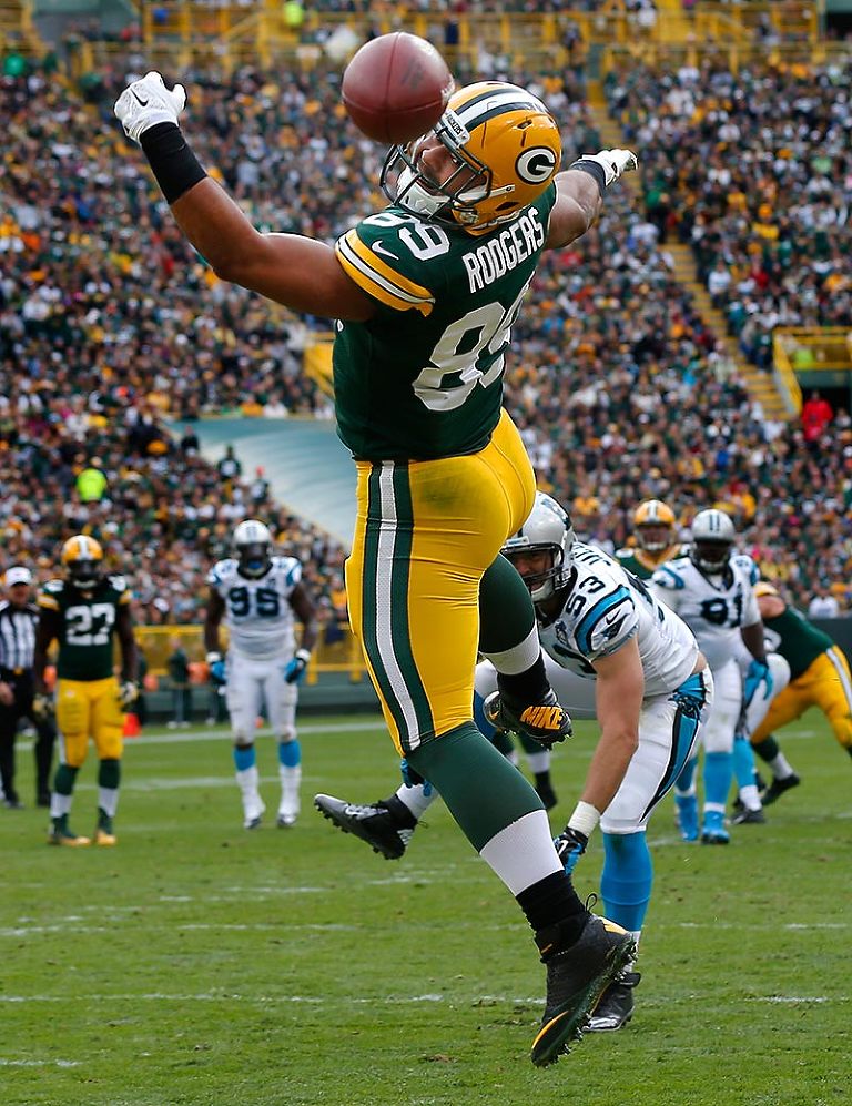 Green Bay Packers tight end Richard Rodgers can't pull in a pass in the end zone as Carolina Panthers linebacker Ben Jacobs defends.