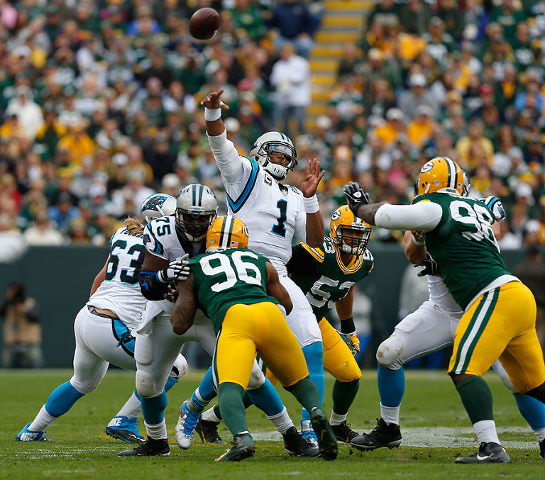 Carolina Panthers quarterback Cam Newton heaves up a long pass.