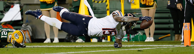 Chicago Bears wide receiver Brandon Marshall stretches out to score a touchdown.