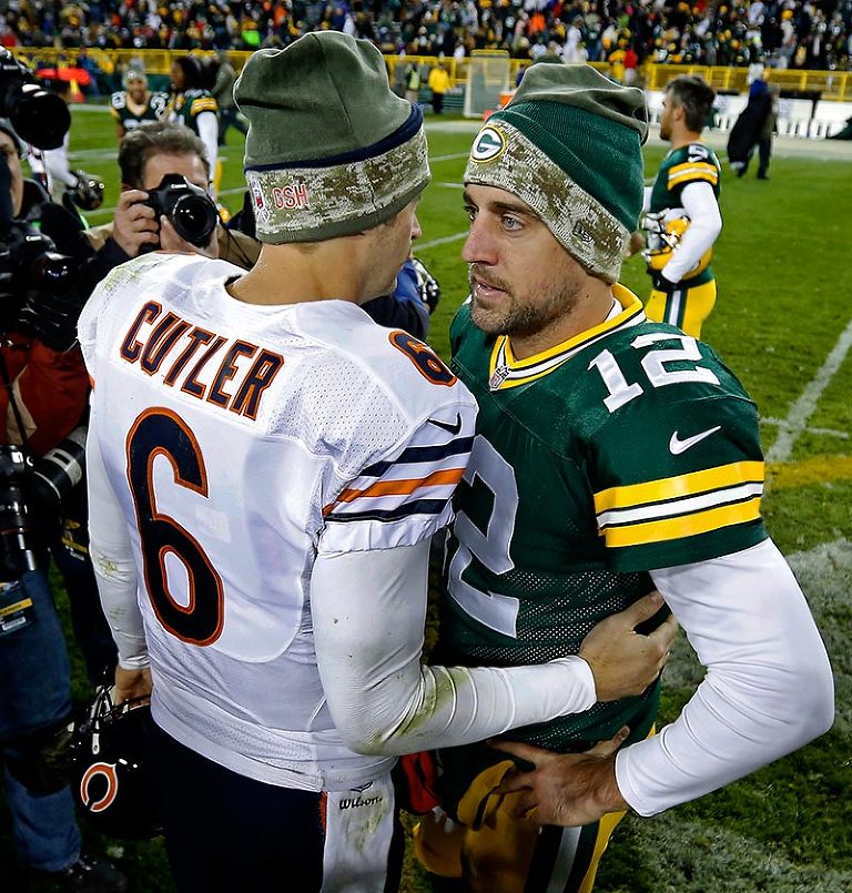 Chicago Bears quarterback Jay Cutler and Green Bay Packers quarterback Aaron Rodgers talk after the game.