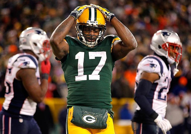 Green Bay Packers wide receiver Davante Adams shows his frustration with dropping a pass in the end zone.