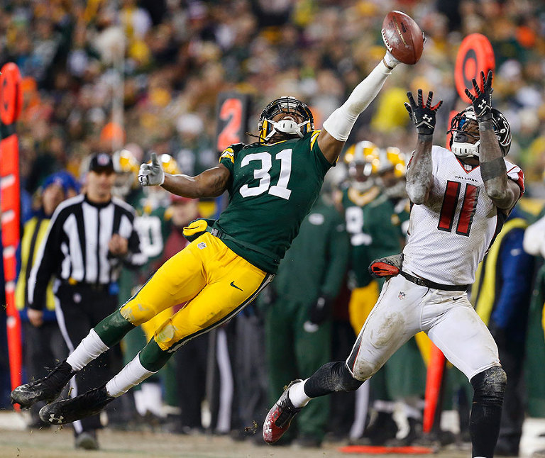 Green Bay Packers cornerback Davon House defends a pass intended for Atlanta Falcons wide receiver Julio Jones.