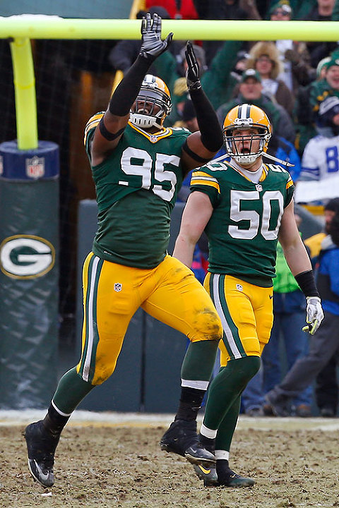 Green Bay Packers defensive end Datone Jones celebrates blocking a field goal.