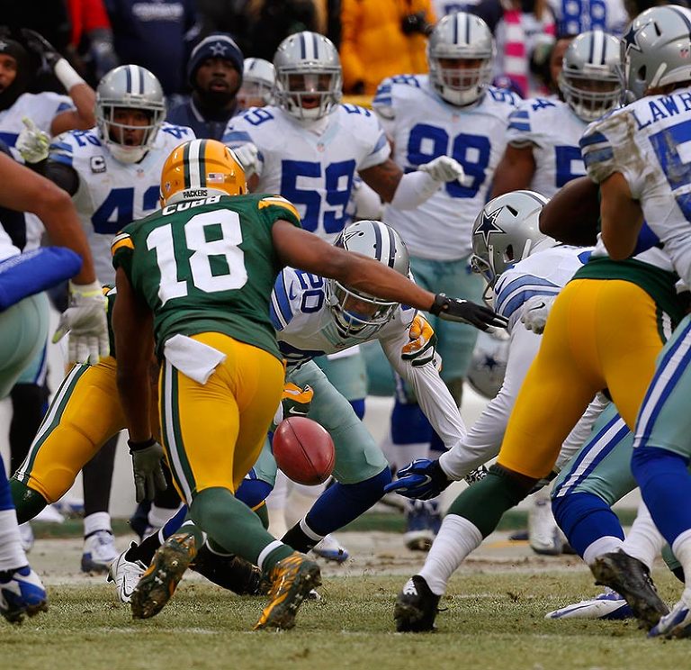 Green Bay Packers wide receiver Randall Cobb chases after his fumble on a kickoff return.  Green Bay Packers tight end Andrew Quarless was able to recover the fumble.