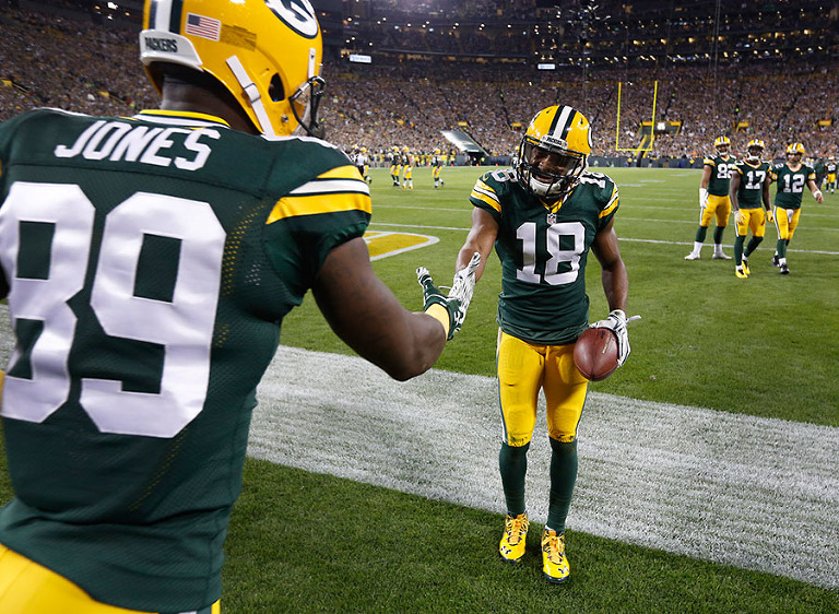 Green Bay Packers wide receiver Randall Cobb congradulates James Jones on his touchdown.