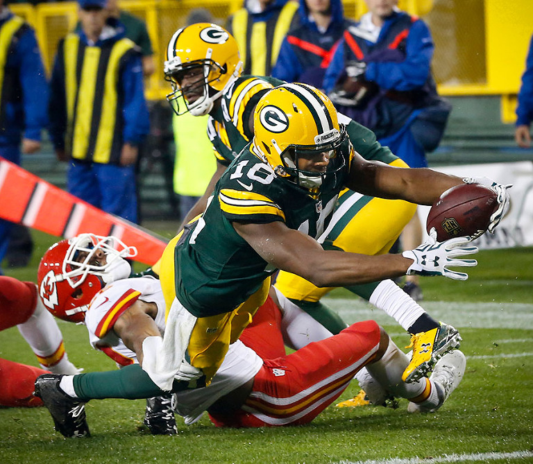 Green Bay Packers wide receiver Randall Cobb scores one of his three touchdowns.