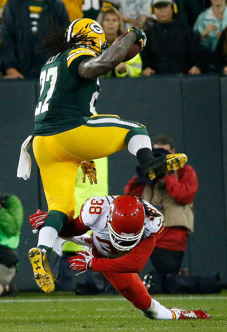 Green Bay Packers running back Eddie Lacy hurdles Kansas City Chiefs strong safety Ron Parker.