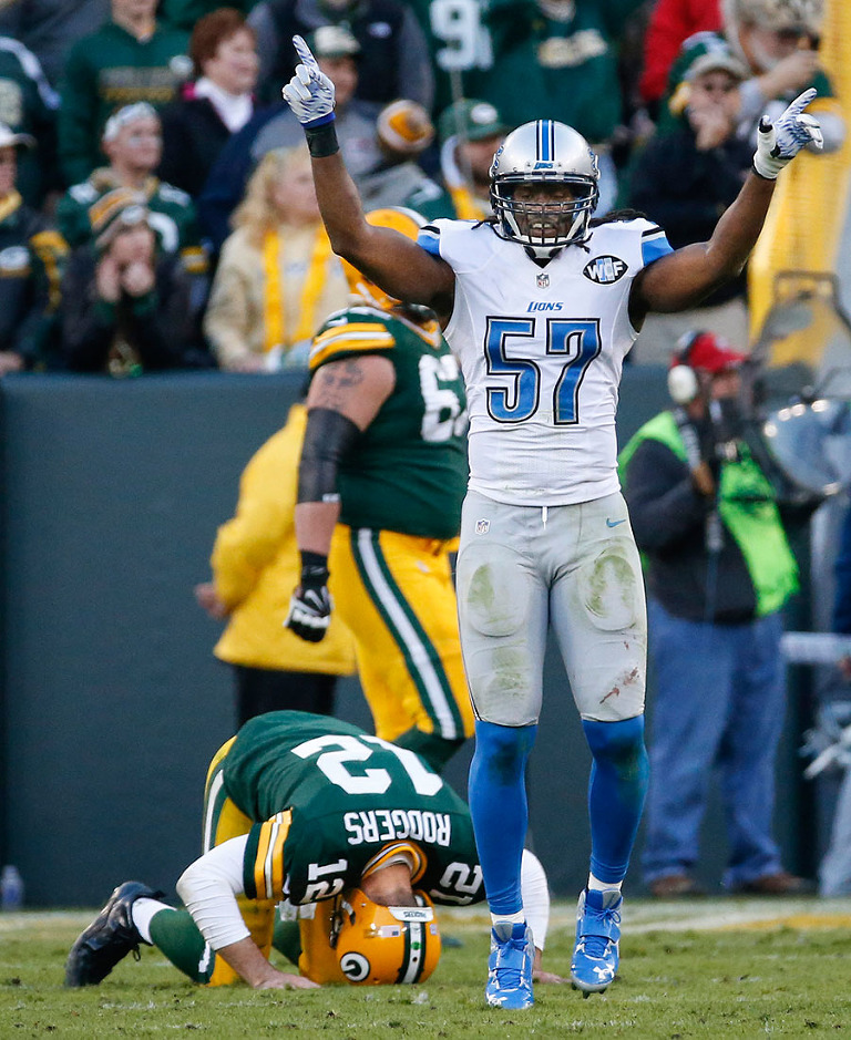 Detroit Lions' Josh Bynes celebrates after the Green Bay Packers failed to convert a two-point conversion to tie the game in the final minute.