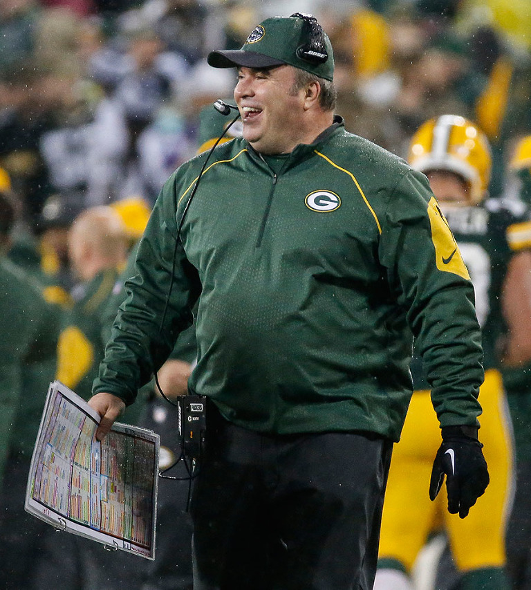 Green Bay Packers head coach Mike McCarthy is all smiles as the Packers take control of the game.