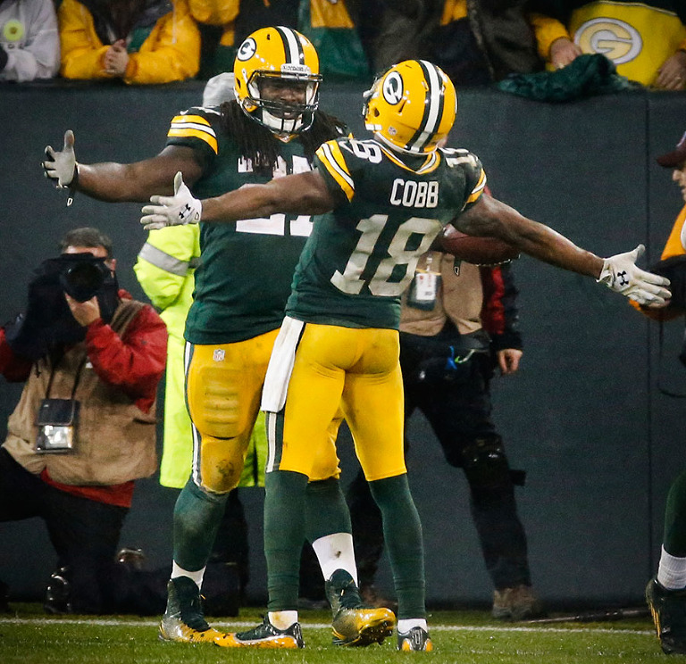 Green Bay Packers running back Eddie Lacy and wide receiver Randall Cobb celebrate.
