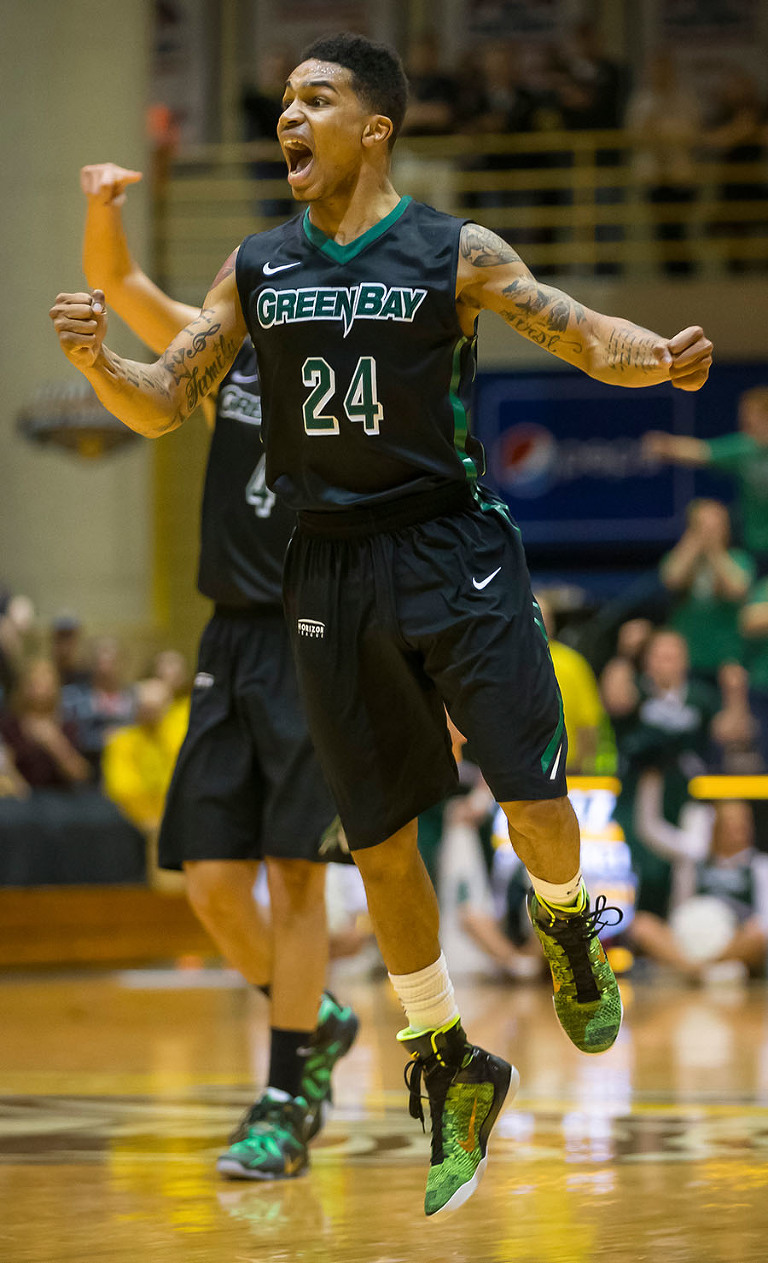 Green Bay men's basketball player Kiefer Sykes celebrates a basket during the Horizon League Championship. The Phoenix would go on to lose the game