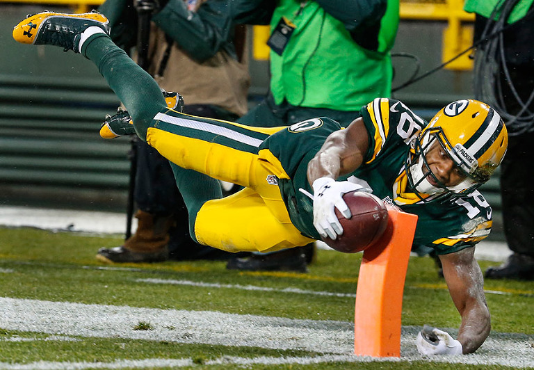 Green Bay Packers wide receiver Randall Cobb can't stay inbounds as he tries to score a touchdown.