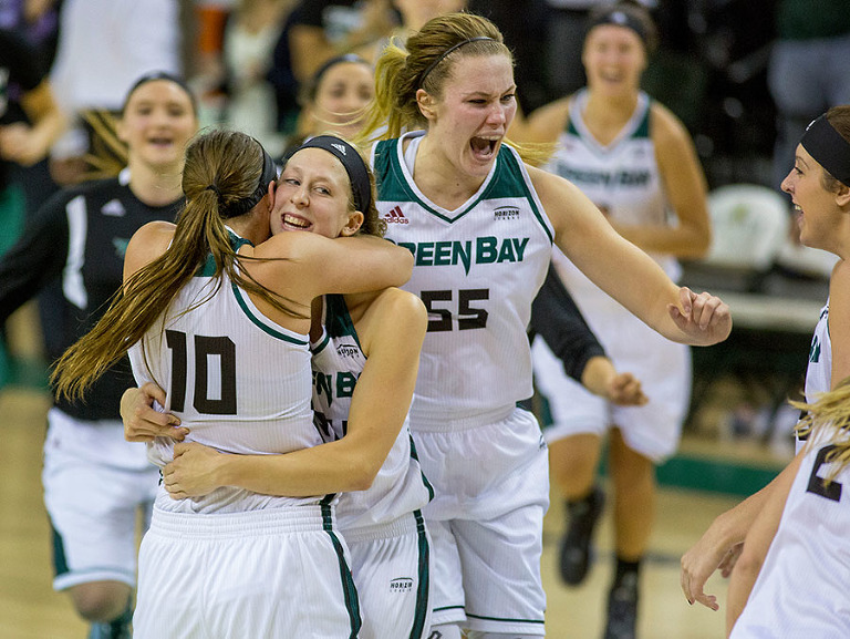 The Green Bay women's basketball team celebrates a last second victory over fellow mid major powerhouse South Dakota State University.