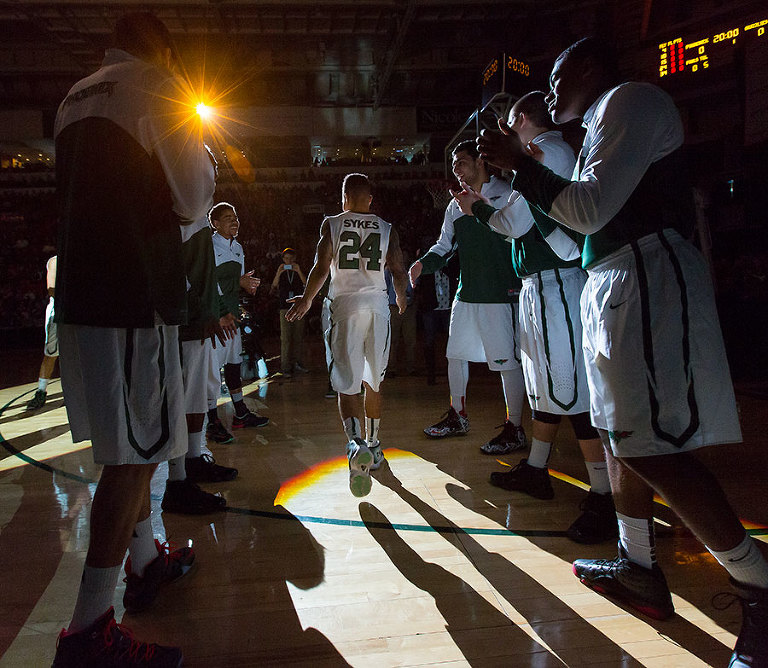 Green Bay men's basketball player Kiefer Sykes during player introductions on senior night.