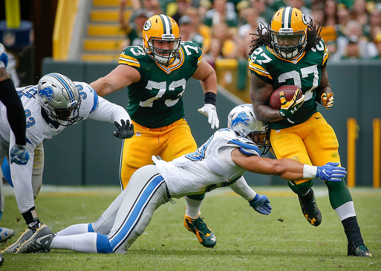 Green Bay Packers running back Eddie Lacy gets a few of his 103 yard on 17 carries.