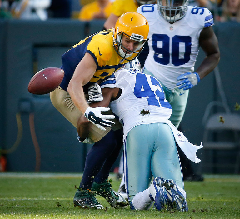 Green Bay Packers wide receiver Jordy Nelson fumbles the ball.