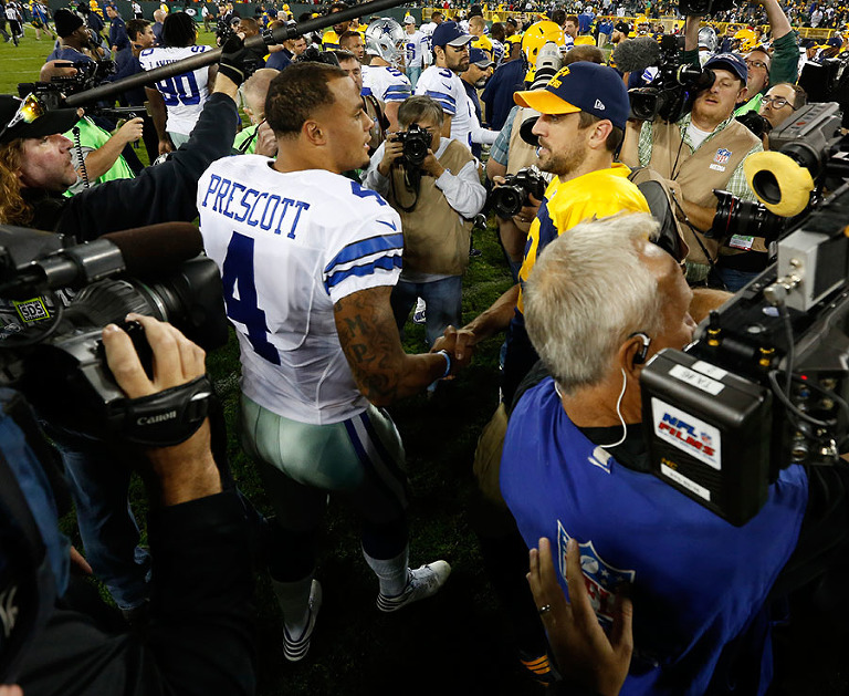 Dallas Cowboys quarterback Dak Prescott and Green Bay Packers quarterback Aaron Rodgers shake hands after the game.