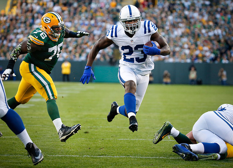 Indianapolis Colts running back Frank Gore scores a first quarter touchdown.