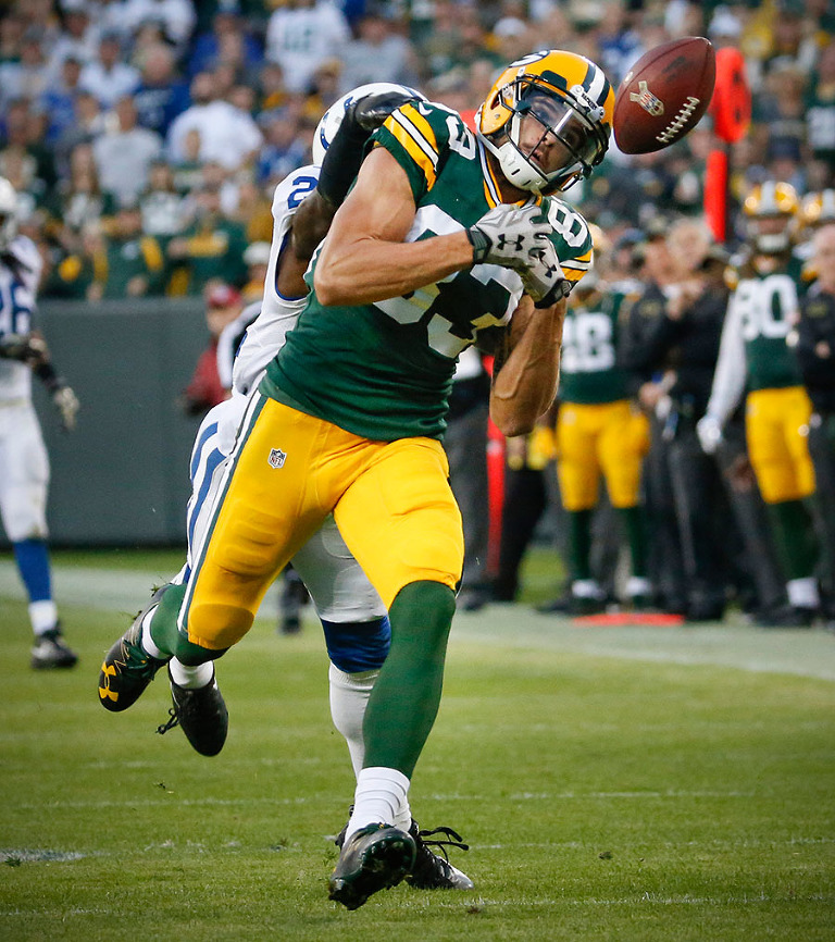 Green Bay Packers wide receiver Jeff Janis watches a pass slip out of his hands.