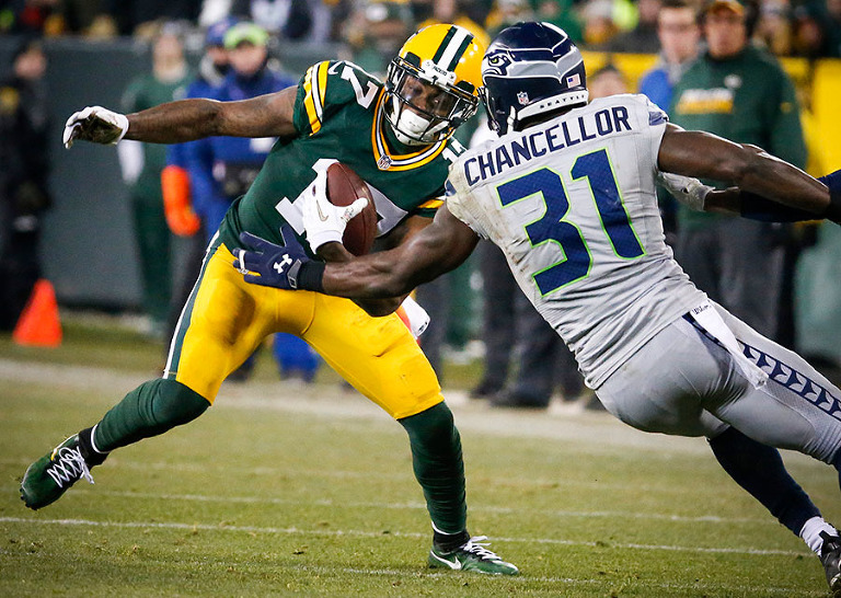 Green Bay Packers wide receiver Davante Adams tries to get around Seattle Seahawks strong safety Kam Chancellor.