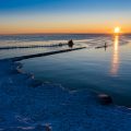 Sunrise over Lake Michigan at the Sturgeon Bay, Wisconsin canal lighthouse.